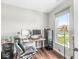 Bright office space with a large window and modern desk setup at 1165 Maclaren Ct, Franklin, IN 46131