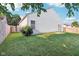 A home's back yard featuring a well-maintained lawn and partial fencing at 12604 Buck Run Dr, Noblesville, IN 46060