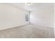 Bright bedroom with neutral carpet, a window, and electrical outlets at 12604 Buck Run Dr, Noblesville, IN 46060