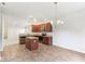 Open kitchen with granite countertops, stainless steel appliances, and dark wood cabinetry at 12604 Buck Run Dr, Noblesville, IN 46060