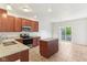 Modern kitchen featuring granite countertops, stainless steel appliances, and an island at 12604 Buck Run Dr, Noblesville, IN 46060