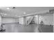 An unfinished basement with concrete floors and white walls, offering customizable space at 1346 Carroll White Dr, Indianapolis, IN 46219