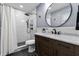 This stunning bathroom features marble countertops and a shower with modern fixtures at 1346 Carroll White Dr, Indianapolis, IN 46219