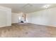Bedroom featuring neutral carpeting, a closet for storage, and exterior access at 1511 E 20Th St, Muncie, IN 47302