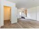 Bedroom featuring neutral carpeting, a closet for storage, and exterior access at 1511 E 20Th St, Muncie, IN 47302