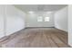 Bedroom featuring neutral carpeting and natural light from the windows at 1511 E 20Th St, Muncie, IN 47302