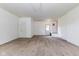 Bedroom featuring neutral carpeting, a closet for storage, and exterior access at 1511 E 20Th St, Muncie, IN 47302