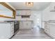 Bright, airy kitchen with modern appliances, stylish cabinets, and a unique mirror backsplash detail at 1511 E 20Th St, Muncie, IN 47302
