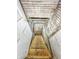 Basement access featuring an exposed, unfinished stairway at 1550 Hoefgen St, Indianapolis, IN 46203