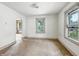 Bright living room with natural light; ready for upgrades and new flooring at 1550 Hoefgen St, Indianapolis, IN 46203