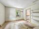 Living area with natural light, convenient shelving, and easy access to kitchen at 1550 Hoefgen St, Indianapolis, IN 46203
