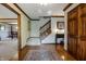 Inviting home foyer with hardwood floors, staircase, and detailed trim at 160 Scranton Ct, Zionsville, IN 46077