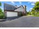 This home features a two car garage, brick and tudor style accents, and a well maintained driveway at 160 Scranton Ct, Zionsville, IN 46077