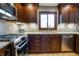 Well-appointed kitchen with stainless steel appliances, and stylish backsplash at 160 Scranton Ct, Zionsville, IN 46077
