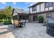 The home's patio has a table and chairs for outdoor enjoyment, as well as backyard access at 160 Scranton Ct, Zionsville, IN 46077