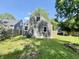 Backyard view of a home with a privacy fence and a small garden at 1601 E 44Th St, Indianapolis, IN 46205