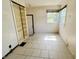 Bright and airy room with tile flooring, white walls, and natural light at 1601 E 44Th St, Indianapolis, IN 46205