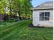 Lush backyard with manicured lawn, providing a serene and private outdoor retreat at 16254 Quartz Dr, Noblesville, IN 46060
