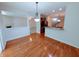Inviting dining area featuring hardwood floors, modern lighting, and easy access to the kitchen and living spaces at 16254 Quartz Dr, Noblesville, IN 46060