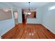 Dining area with hardwood floors, offering a seamless transition to adjacent rooms at 16254 Quartz Dr, Noblesville, IN 46060