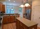 Spacious kitchen featuring wooden cabinets, stainless steel appliances, and an island, perfect for cooking at 16254 Quartz Dr, Noblesville, IN 46060