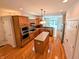 Well-designed kitchen with wooden cabinetry, stainless steel appliances, and a central island for meal prep at 16254 Quartz Dr, Noblesville, IN 46060