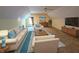 This living room features a comfortable couch and loveseat, with a television at 16254 Quartz Dr, Noblesville, IN 46060