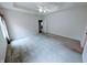 Bright main bedroom with plush carpeting, tray ceiling, and ample space at 16254 Quartz Dr, Noblesville, IN 46060