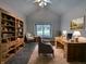 Beautiful home office featuring a wooden desk with chair and a bookshelf at 16254 Quartz Dr, Noblesville, IN 46060