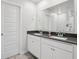 Modern bathroom with double vanity and large mirror at 1911 Goodwin Pl, Westfield, IN 46074