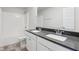This bathroom has a double sink vanity with modern fixtures, and a shower-tub combination at 1911 Goodwin Pl, Westfield, IN 46074