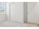 Bedroom with sliding closet doors at 1911 Goodwin Pl, Westfield, IN 46074