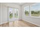 Bright room featuring neutral paint and a sliding glass door with backyard views at 1911 Goodwin Pl, Westfield, IN 46074