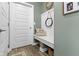 Mudroom entry with bench seating, storage, and hooks, next to the garage entrance at 19959 Cowie Ln, Westfield, IN 46074
