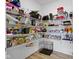 Organized walk-in pantry with ample shelving for food and kitchen storage at 19959 Cowie Ln, Westfield, IN 46074