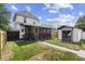 Large backyard featuring a screened-in porch and shed at 2001 S Jefferson St, Muncie, IN 47302