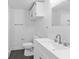 Updated bathroom featuring modern fixtures, sleek vanity, and new floors at 2001 S Jefferson St, Muncie, IN 47302