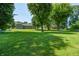 The expansive backyard is perfect for outdoor activities, with plenty of open space and mature trees at 2020 Rosedale Dr, Indianapolis, IN 46227