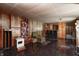 Finished basement with wood paneling, a bar area, and vintage style decor at 2020 Rosedale Dr, Indianapolis, IN 46227