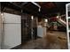 The unfinished basement has a laundry area, utility connections, and potential for customized renovations at 2020 Rosedale Dr, Indianapolis, IN 46227