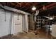 The basement shower is ready for customization and renovation, with open rafters and easy access to utilities at 2020 Rosedale Dr, Indianapolis, IN 46227