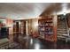 Spacious finished basement featuring wood paneling, vintage decor, and stairs at 2020 Rosedale Dr, Indianapolis, IN 46227