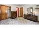 Bedroom with vintage carpet, closet and adjacent bathroom at 2020 Rosedale Dr, Indianapolis, IN 46227