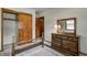 Bedroom with neutral color carpet, dresser and closet at 2020 Rosedale Dr, Indianapolis, IN 46227