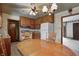 Spacious kitchen with wooden cabinets and an adjacent dining area for convenient meals at 2020 Rosedale Dr, Indianapolis, IN 46227