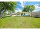 This house features a lush green lawn, inviting porch, and a well-kept exterior, perfect for serene suburban living at 2113 W Barcelona Dr, Muncie, IN 47304