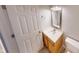 Cozy bathroom featuring a single vanity with great lighting, mirror and neutral wall paint at 2259 Colfax Ln # 2259, Indianapolis, IN 46260