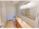 Spacious bathroom with a large vanity, mirror and tile flooring, offering a bathtub and toilet at 2259 Colfax Ln # 2259, Indianapolis, IN 46260