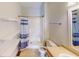 Bright bathroom with a shower, shelves, vanity and a large mirror at 2259 Colfax Ln # 2259, Indianapolis, IN 46260