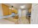Functional kitchen with maple cabinets, laminate countertop and stainless-steel appliances at 2259 Colfax Ln # 2259, Indianapolis, IN 46260